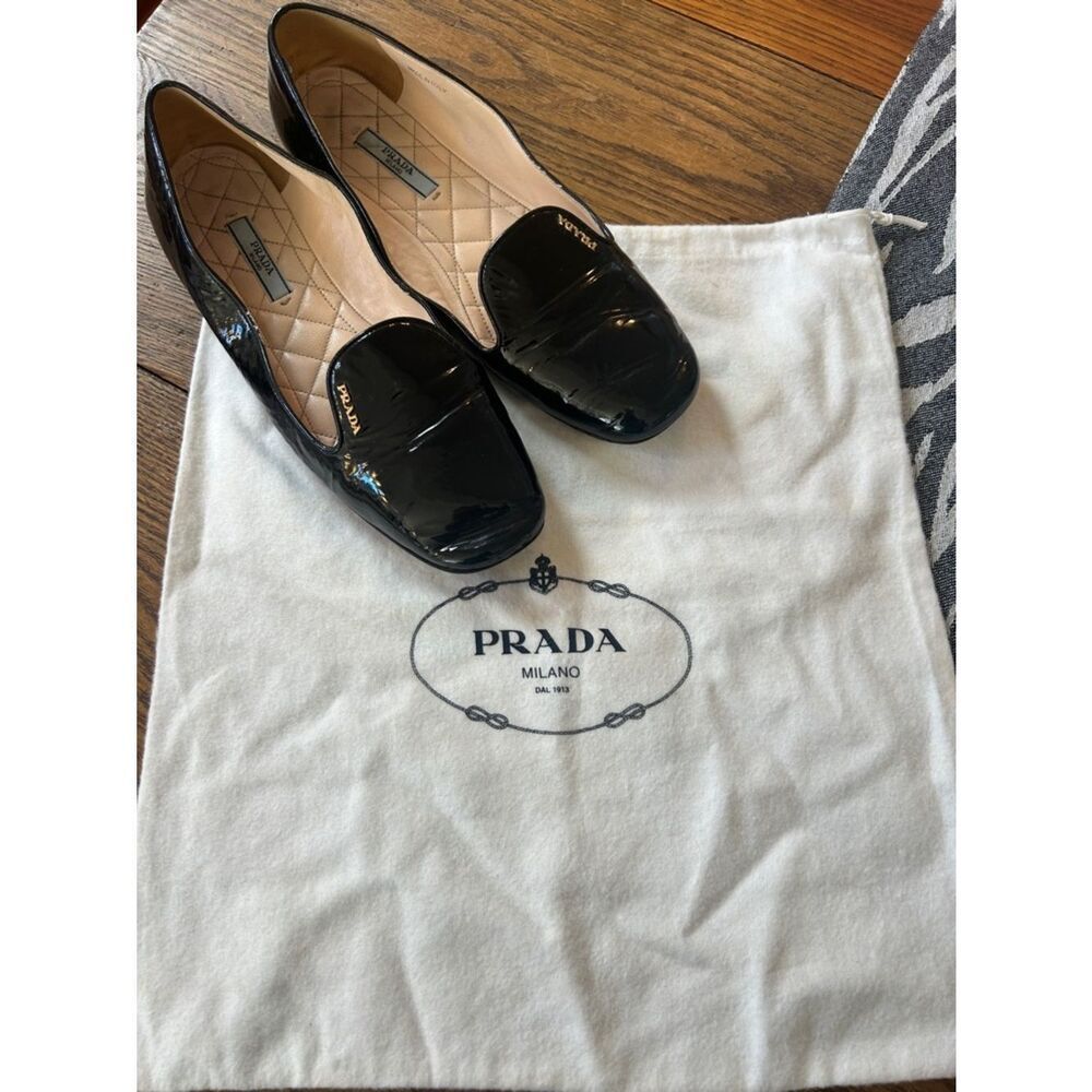 Prada Gold Logo Patent Leather Loafers  and shoe bag. Quilted Footbed.